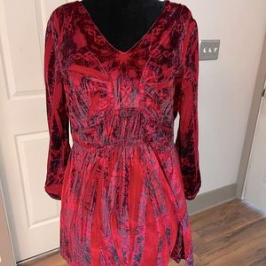 Red and black long sleeve woman’s top